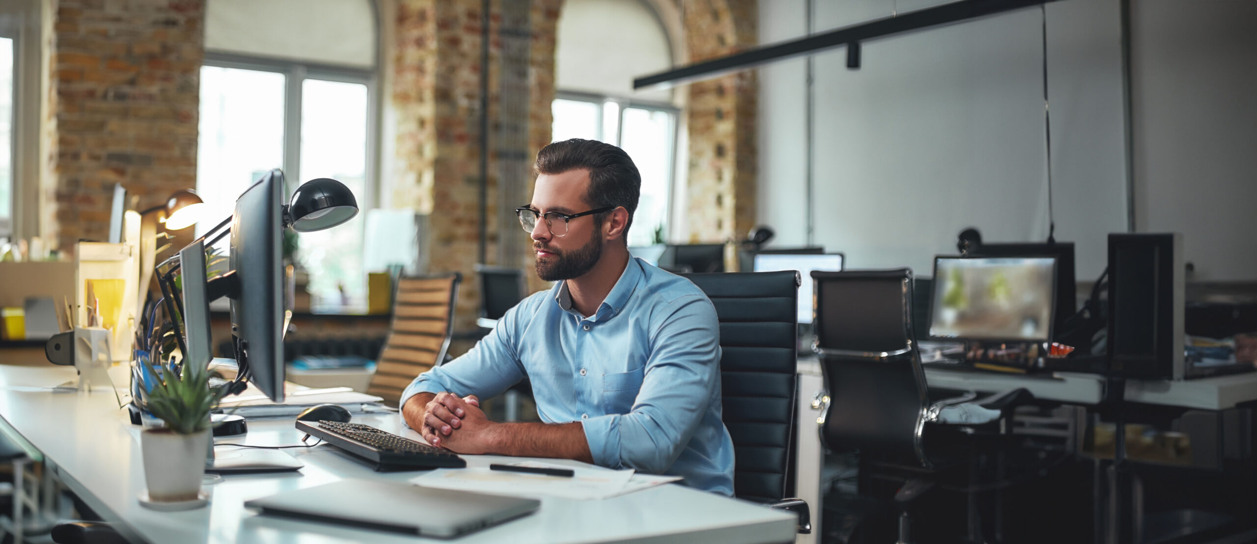 AdobeStock Man at Desk